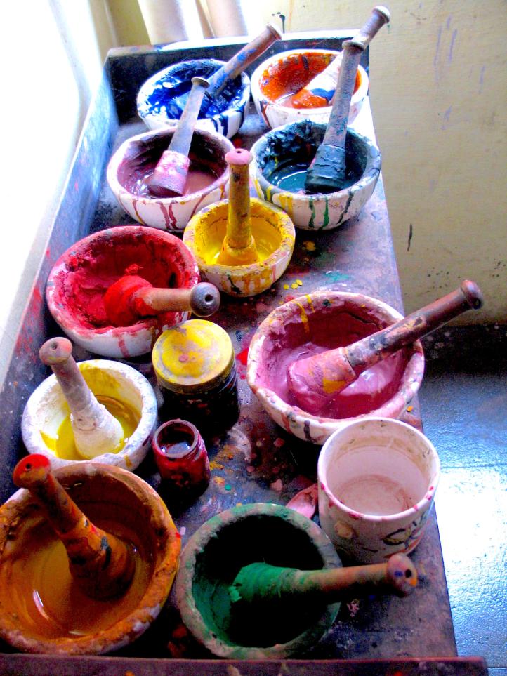 Mixing paint by hand...a physical rainbow